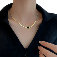 Gold Snake Chain Necklace with Black Heart Pendant – Stainless Steel & Shell 742