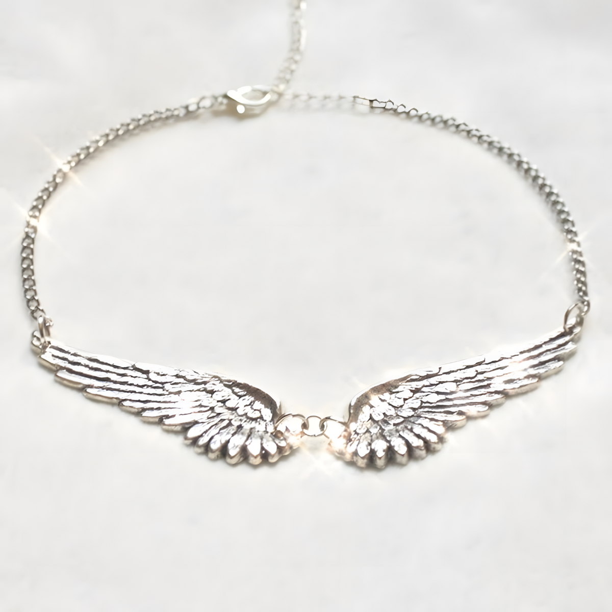 Statement Silver Tone Angel Wings Choker Necklace - Detailed Feather Design B44