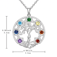 Zinc alloy metal pendant with silver tone finish and seven rainbow crystals 1064