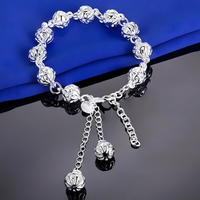 Silver Plated Hollow Filigree Ball Bracelet with Tassel, Womens Adjustable 423